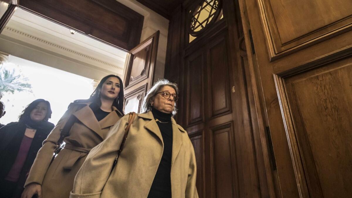 Magda Haroun (R), one of the leaders of the Egyptian Jewish community in the capital Cairo visits the newly renovated Eliyahu Hanavi synagogue in the northwestern Egyptian city of Alexandria on January 10, 2020, on the day of its inauguration. The synagogue, boasting green and violet stained glass windows and towering marble columns, was built in its current form in 1850 by an Italian architect on top of the original edifice dating back to 1354. Khaled DESOUKI / AFP