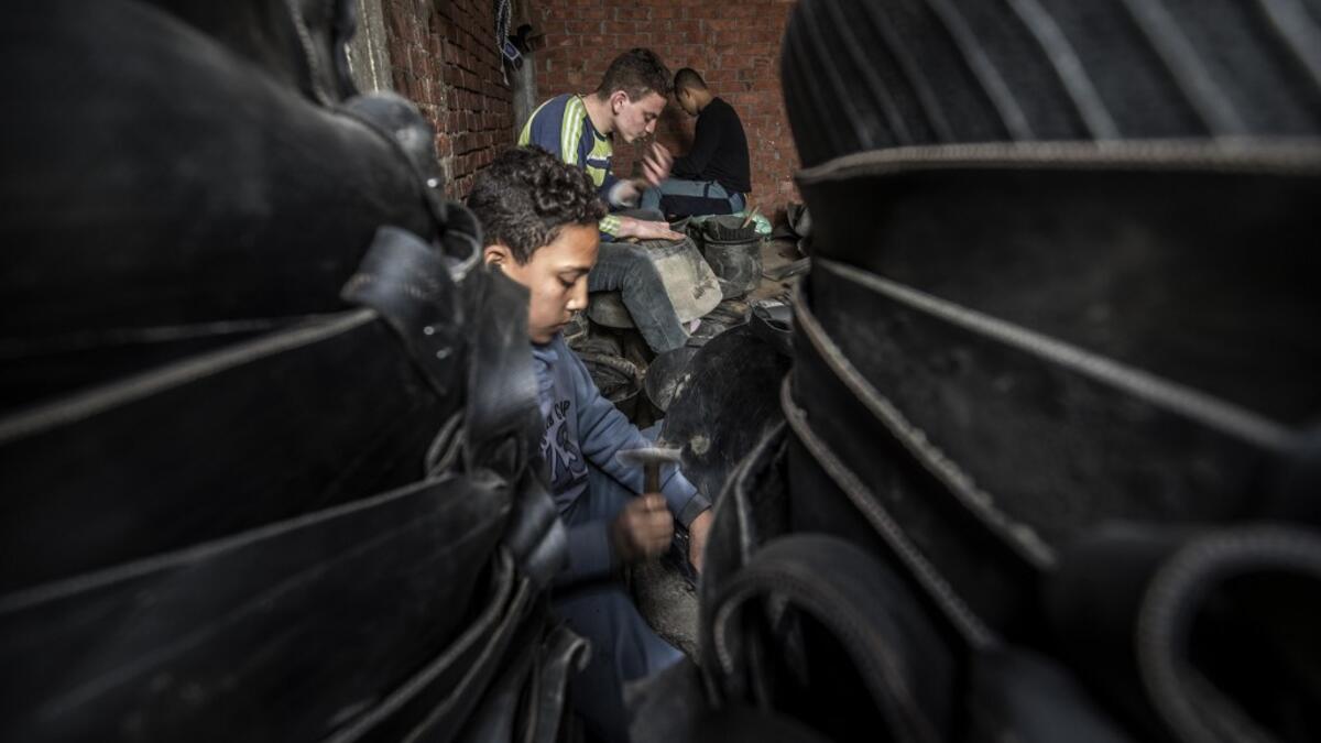 With the material they extract, they make baskets, powder for landscaping and alternative fuels. The small village has become renowned as the country's rubber recycling hub. Khaled DESOUKI / AFP