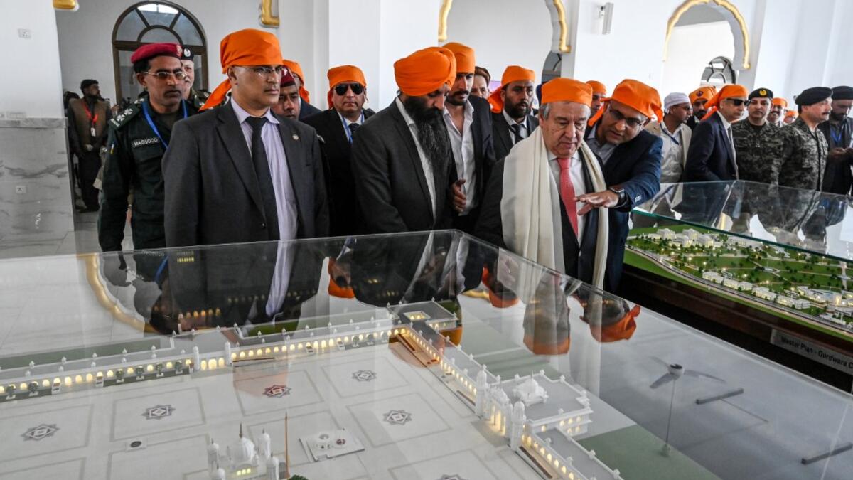 United Nations Secretary-General Antonio Guterres (C) visits the Sikh Shrine of Baba Guru Nanak Dev at the Gurdwara Darbar Sahib in Kartarpur near the Pakistan-India border, on February 18, 2020. Aamir QURESHI / AFP
