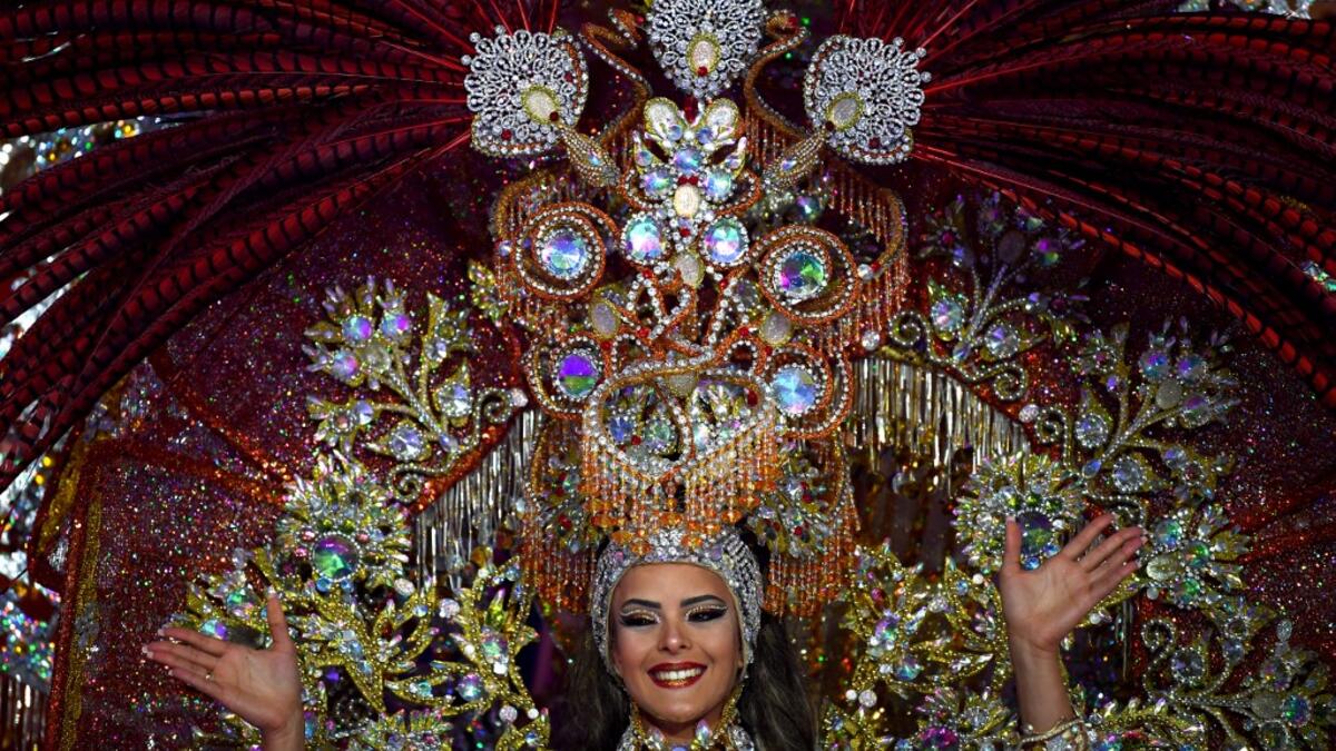 A participant presents her outfit during the Queen of the Carnival pageant contest in Santa Cruz de Tenerife, on the Spanish Canary island of Tenerife, on February 19, 2020. Gabriel BOUYS / AFP