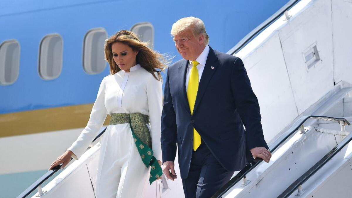 US President Donald Trump and First Lady Melania Trump disembark from Air Force One at Sardar Vallabhbhai Patel International Airport in Ahmedabad on February 24, 2020. MANDEL NGAN / AFP