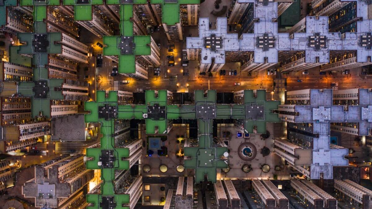 This aerial photograph taken on February 12, 2020 shows a housing estate in Hong Kong. DALE DE LA REY / AFP