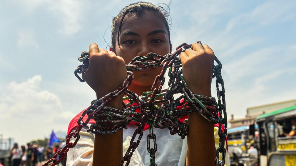Filipino women hold a protest rally during the celebration of International Women's Day in Manila on March 8 2020. Maria TAN / AFP