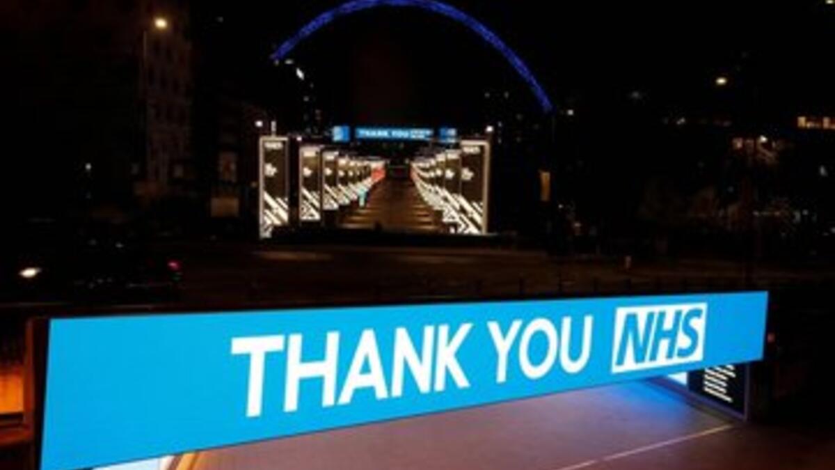 UK landmarks lit up blue for the NHS staff fighting coronavirus. (Twitter)