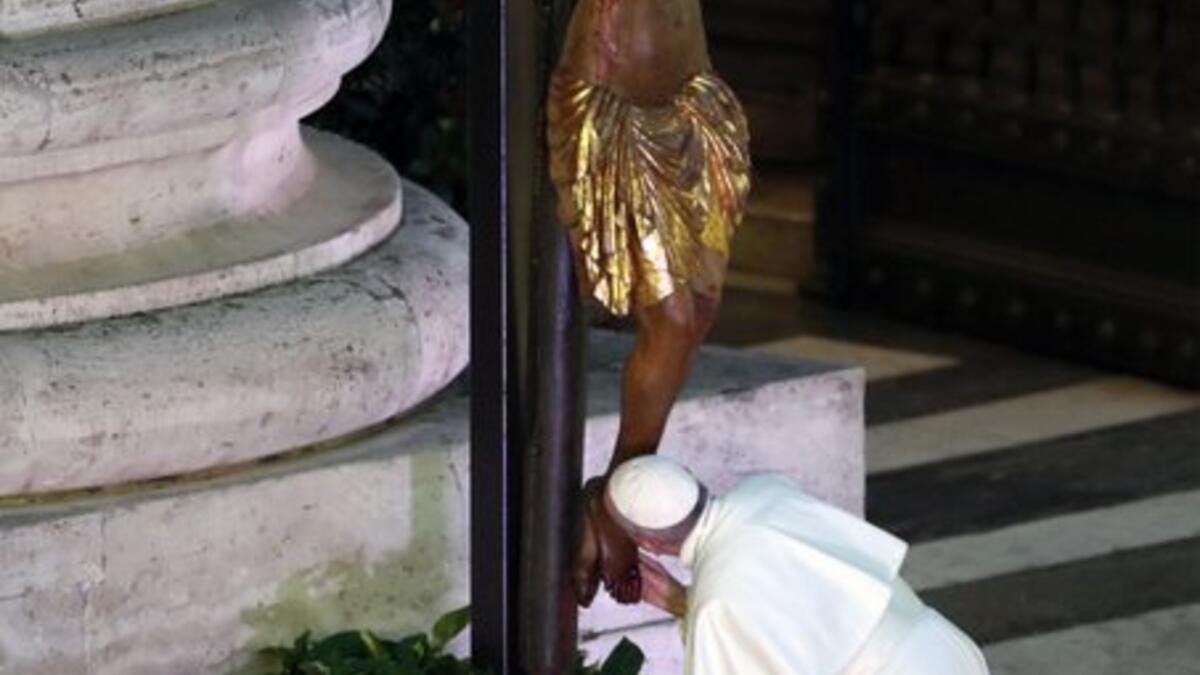 Pope Francis during a moment of prayer on the sagrato of St Peter’s Basilica, the platform at the top of the steps immediately in front of the façade of the Church, to be concluded with the Pope giving the Urbi et Orbi Blessing, on March 27, at the Vatican. YARA NARDI / AFP