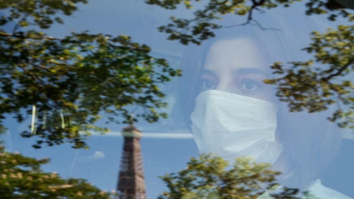 Syrian dancer and choreographer Yara al-Hasbani performs a dance on the empty Trocadero square in Paris on April 22, 2020. Sameer Al-DOUMY / AFP