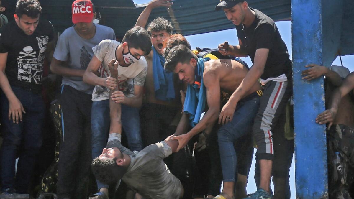 Modest anti-government rallies resumed in some Iraqi cities today, clashing with security forces and ending months of relative calm just days after Prime Minister Mustafa Kadhemi's government came to power. AHMAD AL-RUBAYE / AFP