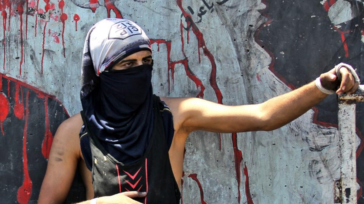 The protests first erupted in Baghdad and Shiite-majority southern cities in October, demanding an end to corruption and unemployment and an overhaul of the ruling class. AHMAD AL-RUBAYE / AFP