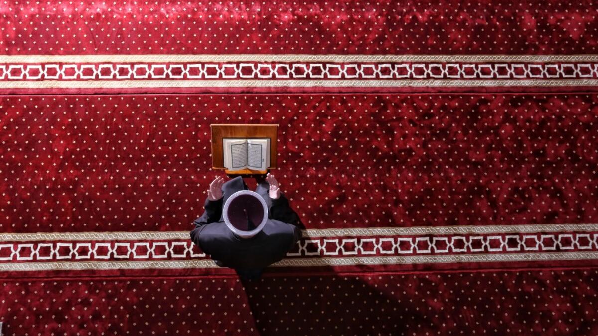 An imam attends Eid al-Fitr prayers, marking the end of the Muslim holy month of Ramadan at the Hadzi Hurem Mosque in the southern city of Novi Pazar on May 24, 2020. Muslims worldwide celebrate Eid Al-Fitr, end of daily fasting during holly month of Ramadan, as one of two most important holidays. Irfan LICINA / AFP