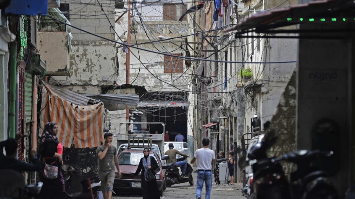 This picture taken on June 3, 2020 shows a view of an alley in the Bab al-Tabbaneh neighbourhood of Lebanon's northern city of Tripoli. Thousands of residents of Lebanon's northern Tripoli struggle to put food on the table, as the country's worst economic crisis in decades has picked up in speed in recent weeks, with food prices rising by more than 70 percent since the autumn. Inflation has been a blow in the country where more than 45 percent of the country's population now lives below the poverty line, an