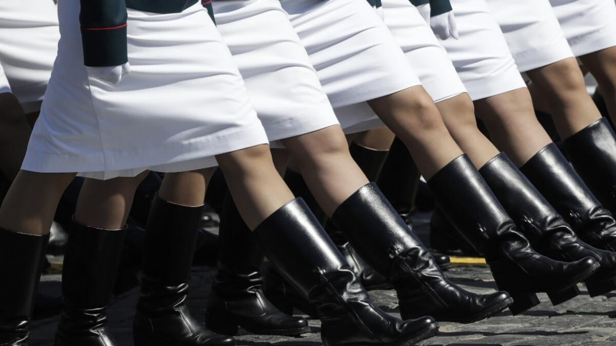 Russian servicewomen march on Red Square during a military parade, which marks the 75th anniversary of the Soviet victory over Nazi Germany in World War Two, in Moscow on June 24, 2020. The parade, usually held on May 9, was postponed this year because of the coronavirus pandemic. Pavel Golovkin / POOL / AFP
