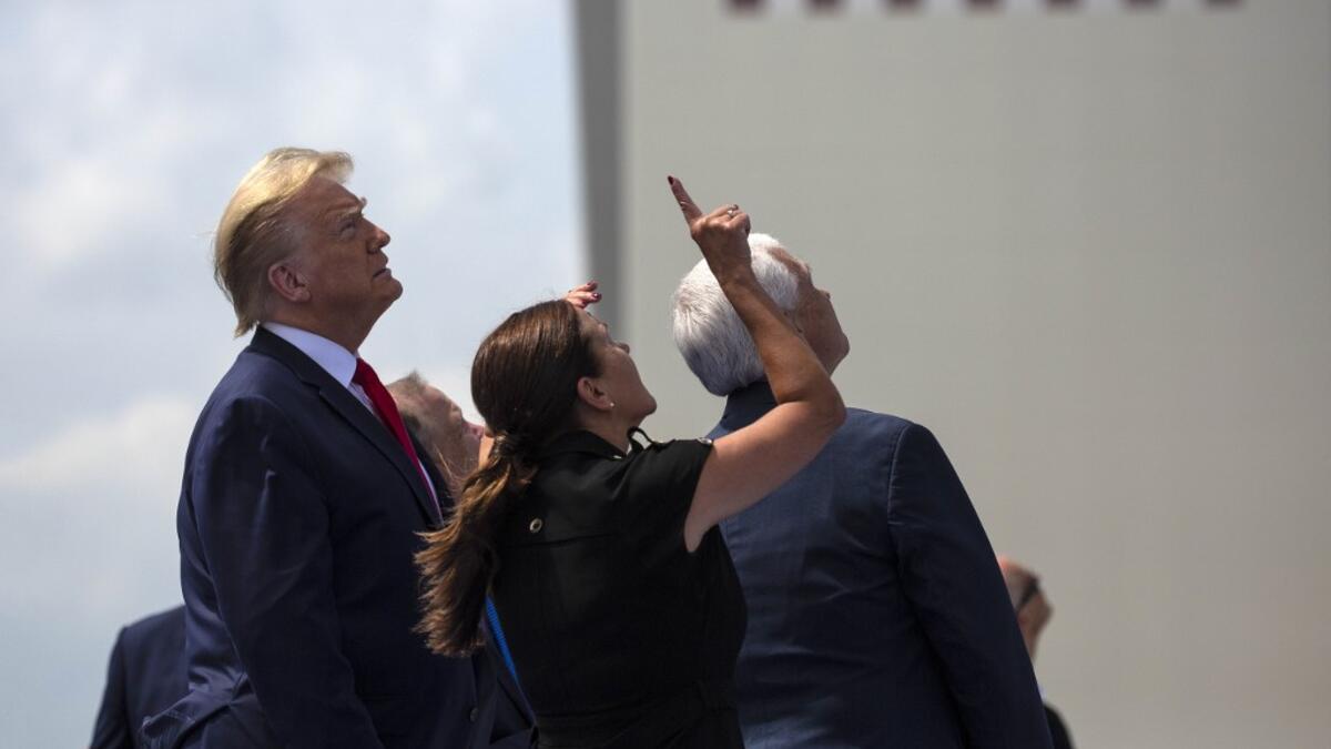 President Donald Trump (L) Second Lady Karen Pence (C) Vice President Mike Pence (R) watch from the rooftop of the Operational Building at NASA during the launch of the SpaceX Falcon 9 rocket with NASA astronauts Bob Behnken (R) and Doug Hurley aboard the rocket from the Kennedy Space Center on May 30, 2020 in Cape Canaveral, Florida. The inaugural flight is the first manned mission since the end of the Space Shuttle program in 2011 to be launched into space from the United States. Saul Martinez/Getty Image