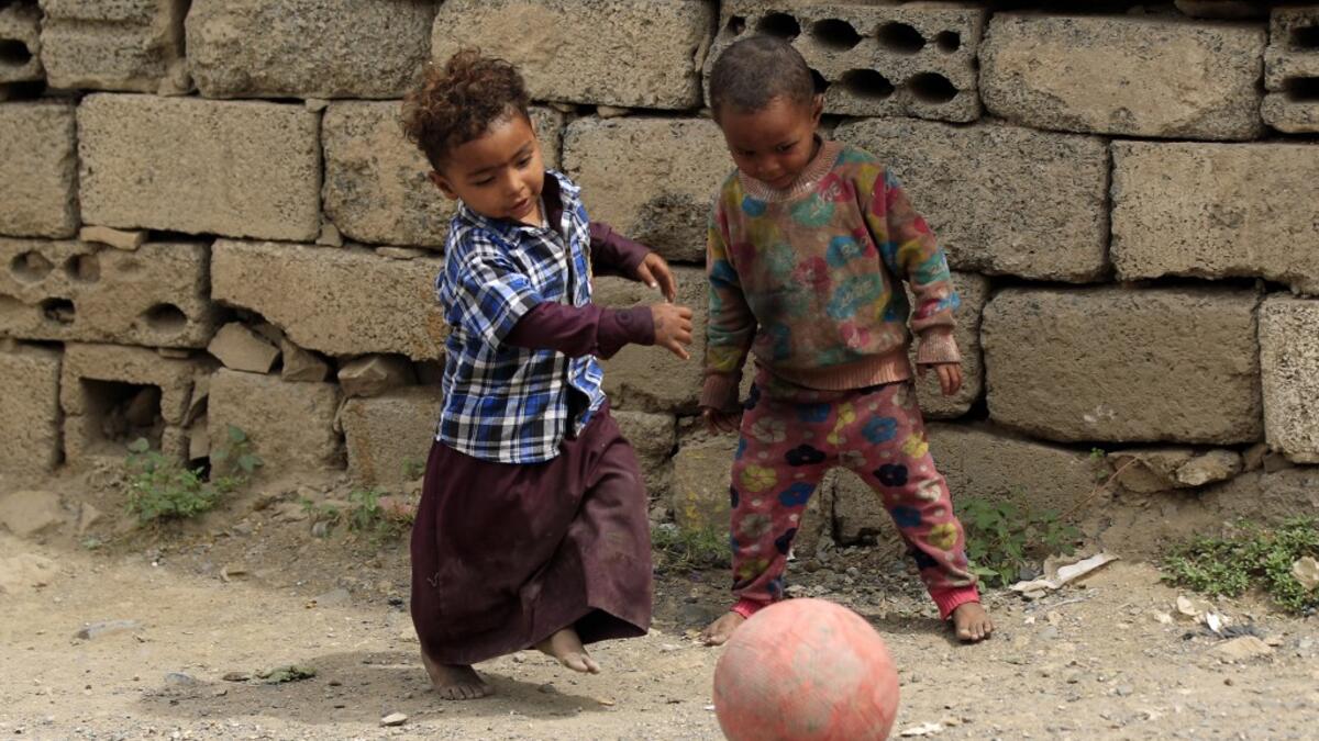 Children of Yemen's minority group known as "Muhamasheen" -- literally the "Marginalised" are pictured at a slum in the capital Sanaa on July 4, 2020. At a time when the Black Lives Matter movement is reshaping societies, black Yemenis have scant hope for an end to centuries of discrimination that has only worsened during the civil war. In Sanaa, members of the minority group known as "Muhamasheen" live in dismal conditions in densely populated slums. They count among the poorest of the poor in the Arab wor