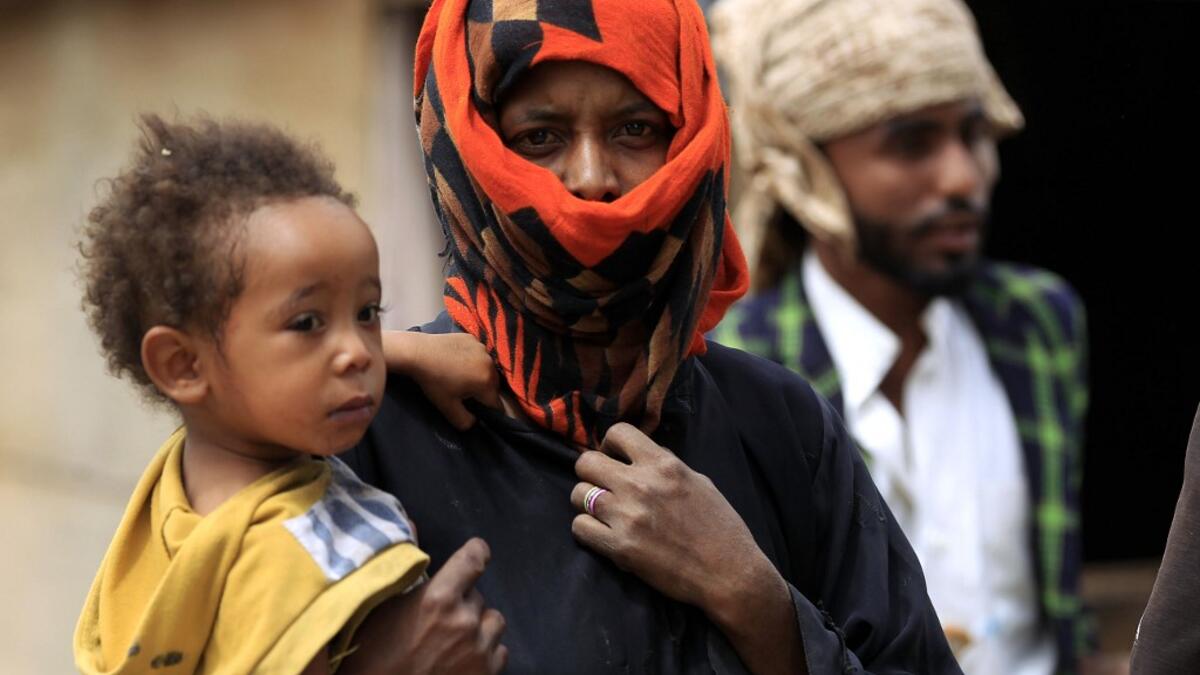 Members of Yemen's minority group known as "Muhamasheen" -- literally the "Marginalised" are pictured at a slum in the capital Sanaa on July 4, 2020. At a time when the Black Lives Matter movement is reshaping societies, black Yemenis have scant hope for an end to centuries of discrimination that has only worsened during the civil war. In Sanaa, members of the minority group known as "Muhamasheen" live in dismal conditions in densely populated slums. They count among the poorest of the poor in the Arab worl