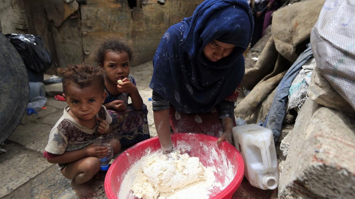 Members of Yemen's minority group known as "Muhamasheen" -- literally the "Marginalised" are pictured at a slum in the capital Sanaa on July 4, 2020. At a time when the Black Lives Matter movement is reshaping societies, black Yemenis have scant hope for an end to centuries of discrimination that has only worsened during the civil war. In Sanaa, members of the minority group known as "Muhamasheen" live in dismal conditions in densely populated slums. They count among the poorest of the poor in the Arab worl