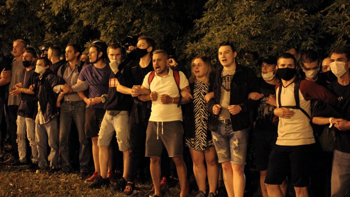 Opposition supporters protest after polls closed in Belarus' presidential election, in Minsk on August 9, 2020. Siarhei LESKIEC / AFP
