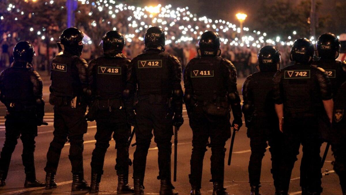 Opposition supporters protest after polls closed in Belarus' presidential election, in Minsk on August 9, 2020. Siarhei LESKIEC / AFP
