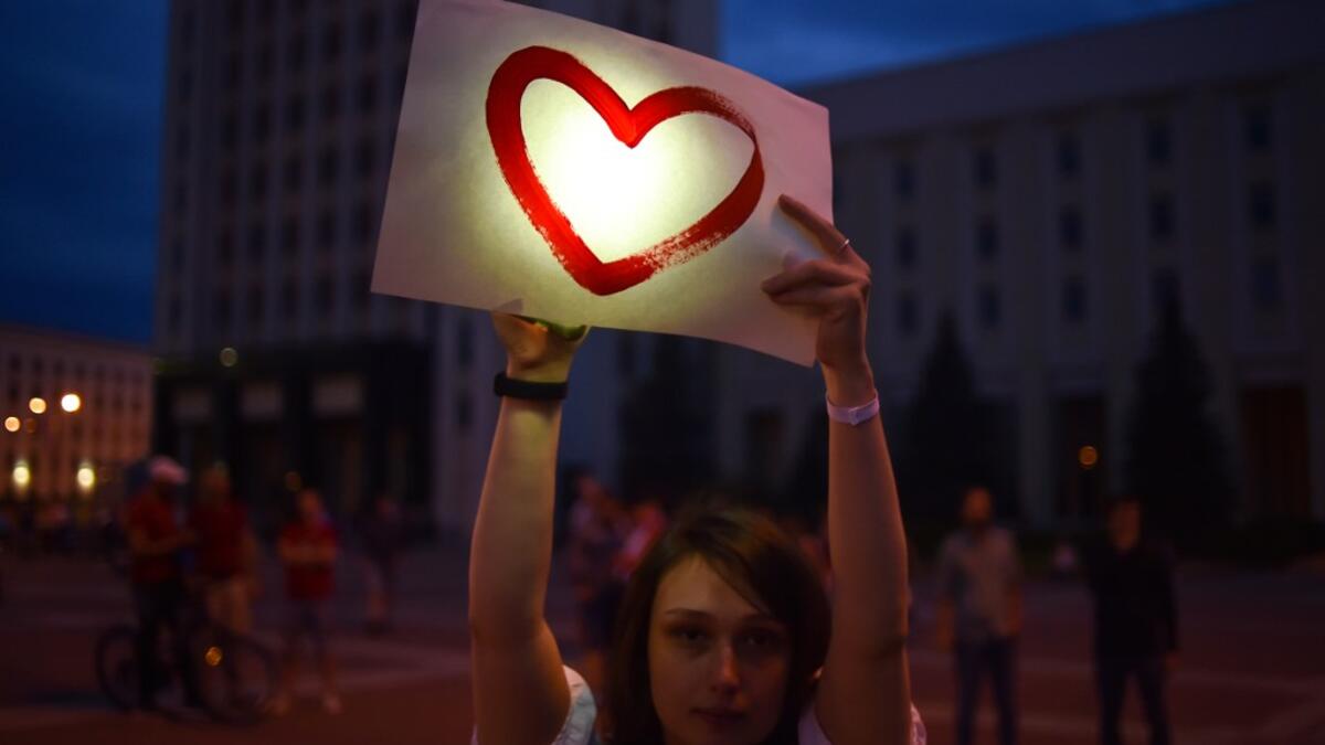 Opposition supporters protest against disputed presidential elections results at Independence Square in Minsk on August 18, 2020. Sergei GAPON / AFP