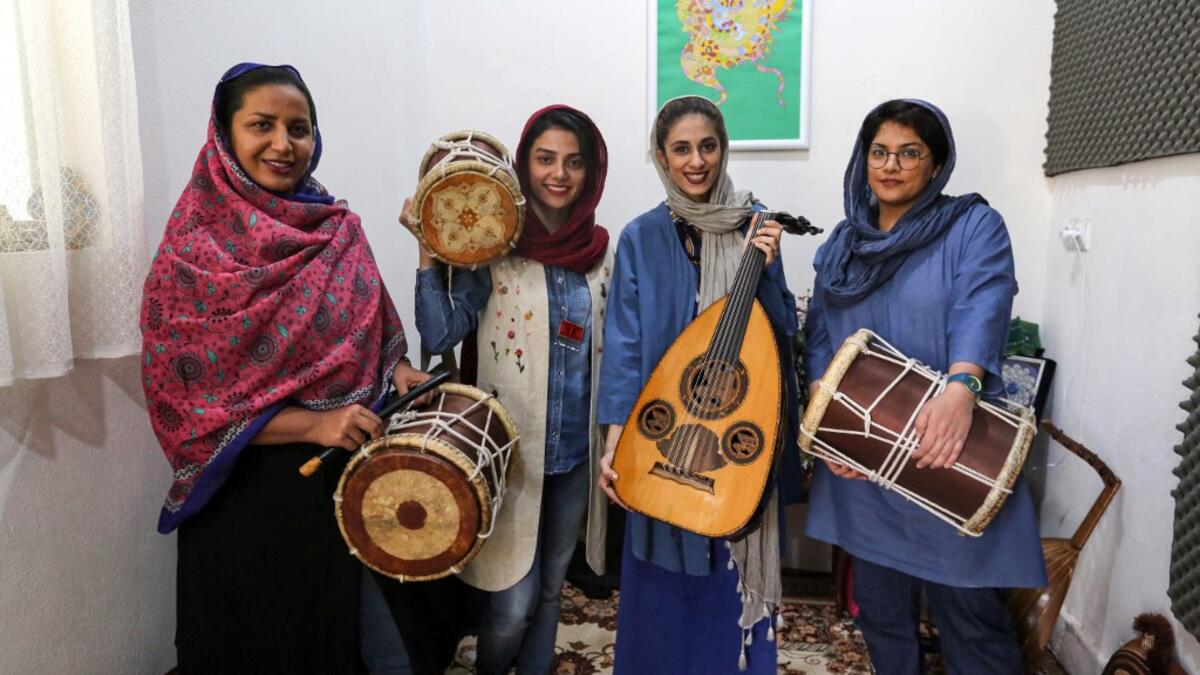 The all-women band "Dingo" -- which in the local dialect refers to the first wobbly steps of infants as they learn to walk -- was formed in late 2016, but their performance in April 2019 was only the second time that they had been able to play to a mixed audience at the state-organised "Persian Gulf music" festival in Bandar Abbas. ATTA KENARE / AFP