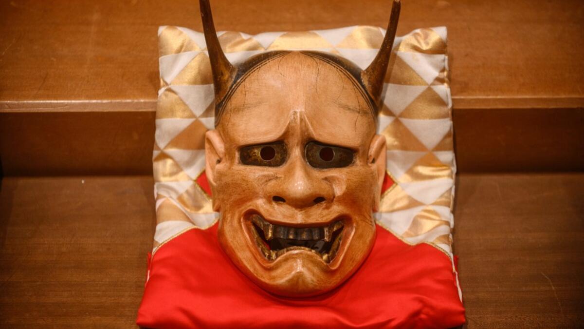 This photo taken on July 29, 2020 shows a mask displayed at the Kamakura Noh Theatre in the town of Kamakura in Kanagawa Prefecture, about one hour southwest of Tokyo. Philip FONG / AFP
