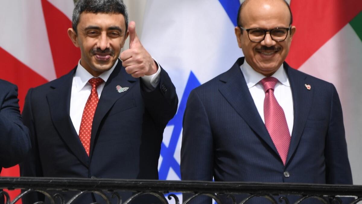 (L-R) UAE Foreign Minister Abdullah bin Zayed Al-Nahyan and Bahrain Foreign Minister Abdullatif al-Zayani pose before they participate in the signing of the Abraham Accords where the countries of Bahrain and the United Arab Emirates recognize Israel, on the South Lawn of the White House in Washington, DC, September 15, 2020.