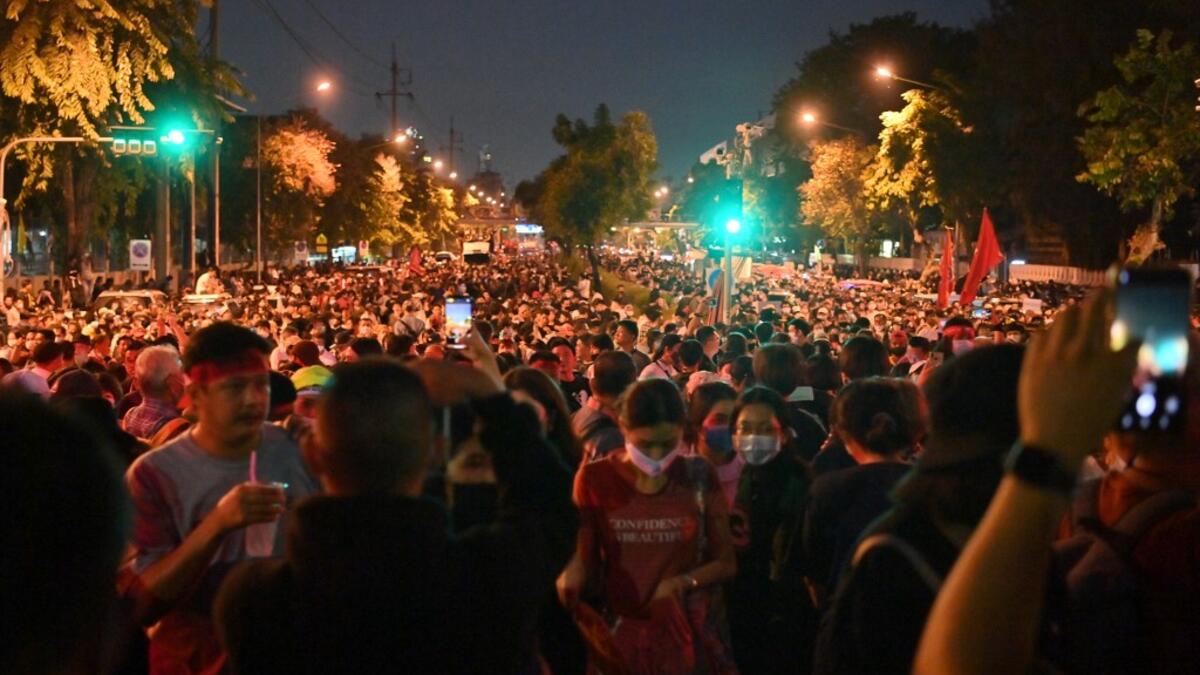 Pro-democracy protesters take part in an anti-government rally next to Government House in Bangkok on October 14, 2020. Mladen ANTONOV / AFP