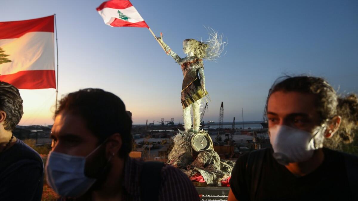 Hundreds marched in Lebanon's capital to mark the first anniversary of a non-sectarian protest movement that has rocked the political elite but has yet to achieve its goal of sweeping reform. ANWAR AMRO / AFP
