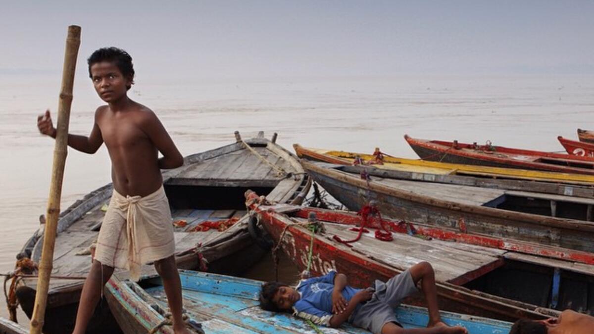 Saudi Photographer Hesham Alhumaid: Fisherman Child - Varanasi - India. (Instagram/@hesh4m)
