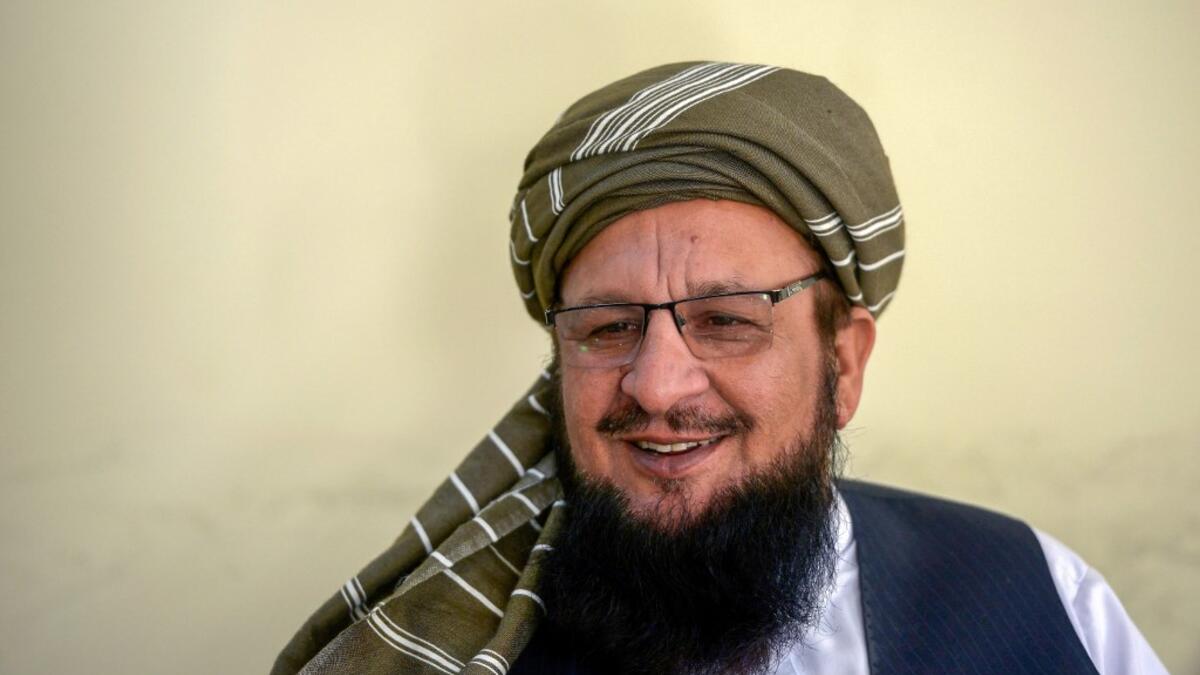 In this picture taken on October 19, 2020 spokesman of religious political pary, Jamiat Ulema Islam-Sami (JUI-S), Maulana Yousaf Shah speaks during an interview with AFP at the Darul Uloom Haqqania seminary in Akora Khattak. Shah cracks a wide smile as he rattles off a list of former students turned Taliban leaders, revelling in their victories over superpowers on Afghanistan's battlefields after graduating from Pakistan's "university of jihad".