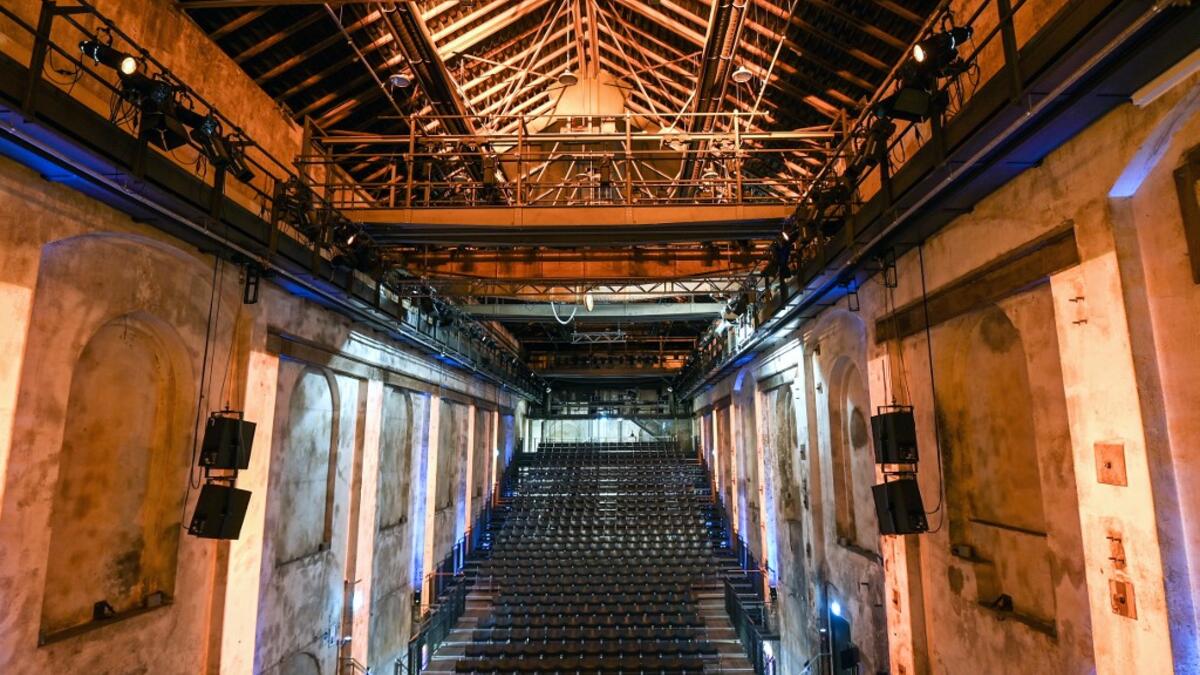 A picture taken on November 20, 2020 shows empty seats at the Geblaesehalle theater at the Landschaftspark Duisburg-Nord in Duisburg, western Germany. The Geblaesehalle is part of the steam blower house, a building complex from the founding phase of the former steelworks of August Thyssen and owns 1000 seats. No public events will take place at theaters until December, 2020 to limit the spread of the novel coronavirus. Ina FASSBENDER / AFP