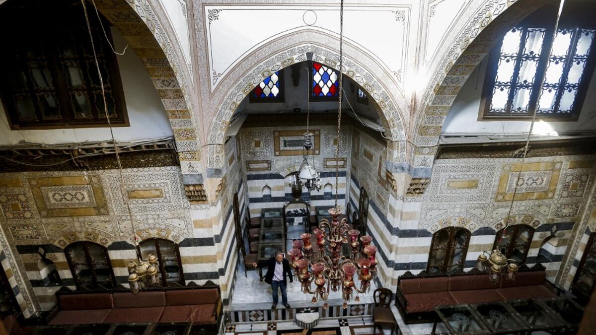 The old city of the Syrian capital is famed for its elegant century-old houses, usually two storeys built around a leafy rectangular courtyard with a carved stone fountain at its centre. While the capital has been largely spared the violence of Syria's almost ten-year war, several of these traditional homes have been abandoned by their owners or damaged in the conflict. LOUAI BESHARA / AFP