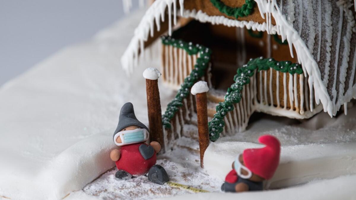 While members of the public would usually come to visit the exhibition in the Swedish capital, due the the Covid-19 pandemic, the gingerbread houses are stored at the museum and fans can visit ArkDes's website to view the entries, which include models of Sweden's state epidemiologist Anders Tegnell, climate activist Greta Thunberg, gnomes wearing surgical masks and families making the video calls that have become a more common way to stay in touch since the pandemic's start.  Jonathan NACKSTRAND / AFP