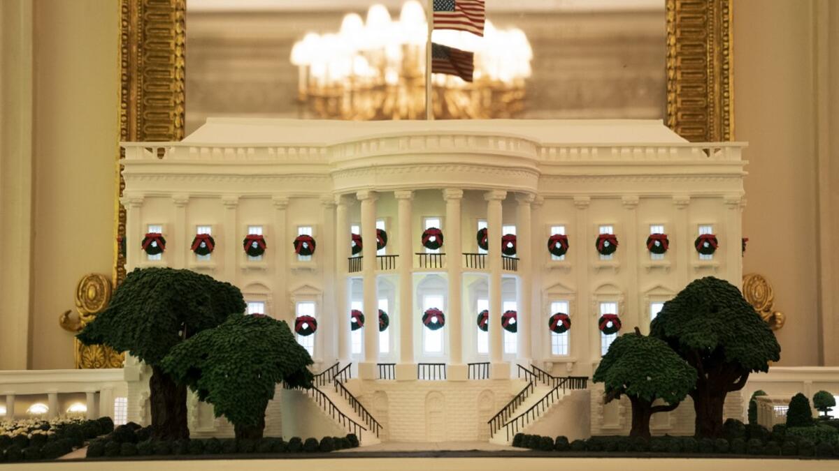 White House gingerbread house is displayed in the State Dining Room of the White House on November 30, 2020 in Washington, DC. This year's theme for the White House Christmas decorations is "America the Beautiful." Drew Angerer/Getty Images/AFP
