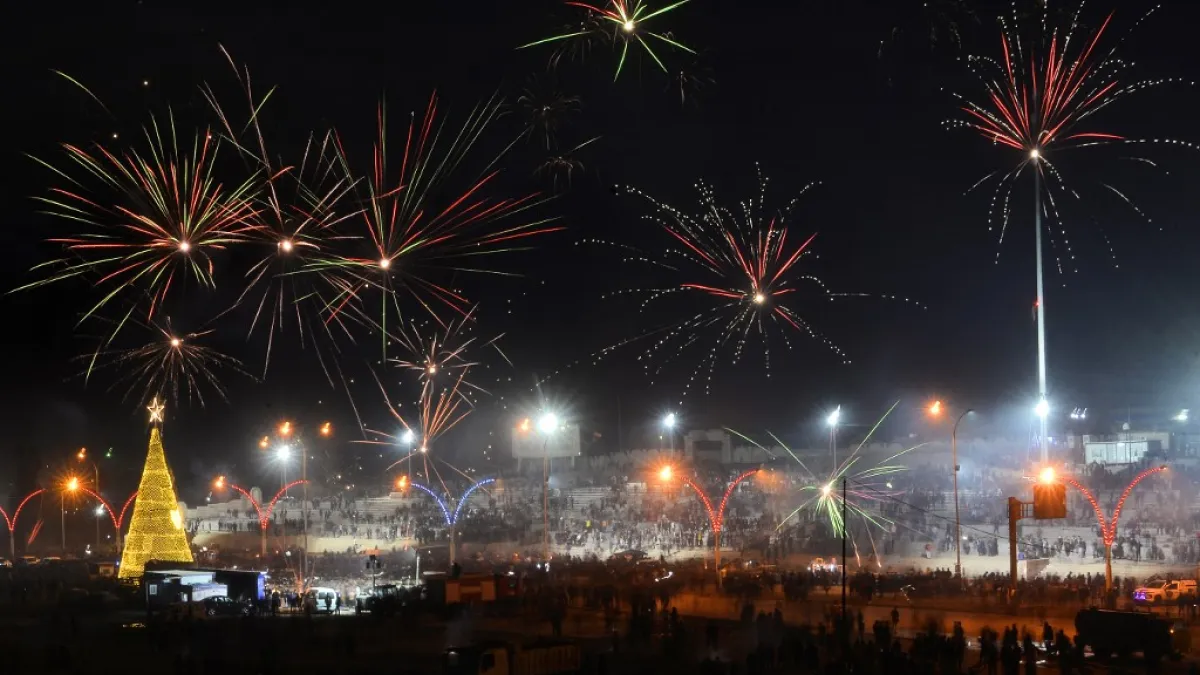 Iraqis celebrate New Year's Eve in the northern city Mosul on December 31, 2020. Zaid AL-OBEIDI / AFP