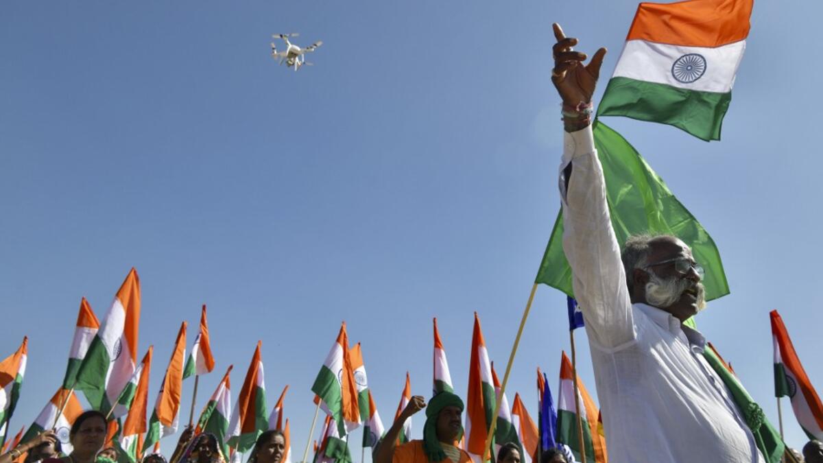 Activists and farmers take part in a protest as they continue to demonstrate against the central government's recent agricultural reforms, in Bangalore on January 26, 2021. Manjunath Kiran / AFP