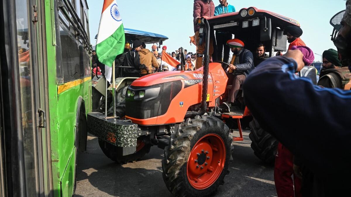 Farmers take part in a rally as they continue to protest against the central government's recent agricultural reforms, in New Delhi on January 26, 2021. Sajjad HUSSAIN / AFP