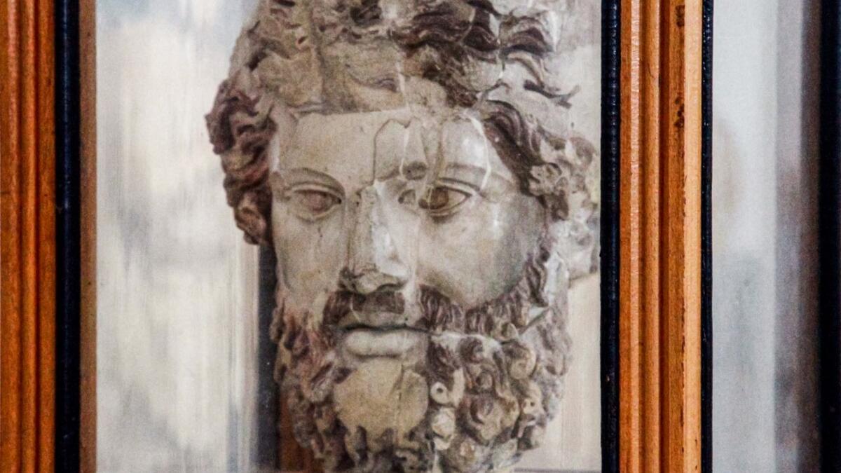 view of a Greek sculpture of the head of Zeus on display at the Cyrene Museum which houses Greco-Roman artefacts, in the eastern Libyan town of Shahat