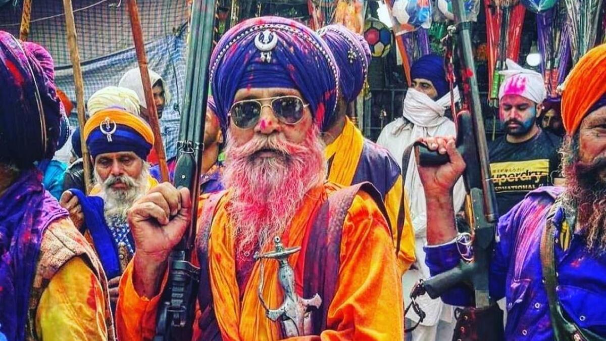 These immortals (Akalis) bite like crocodiles (Nihangs) they don't play they fight (hola) and if they come charging (mohalla) you better get out of the way.