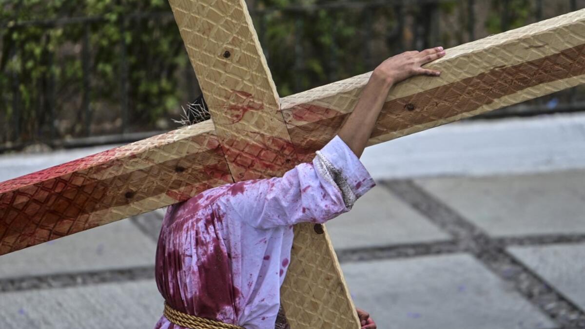 An actor reenacts the Passion of the Christ in Iztapalapa neighbourhood in eastern Mexico City on April 2, 2021, as the Holy Week Good Friday