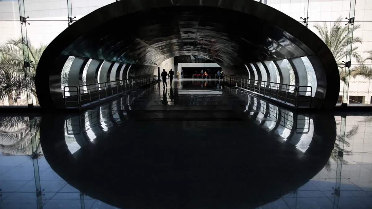 Visitors walk down a hallway at Egypt's new National Museum of Egyptian Civilisation (NMEC), in the Fustat district of Old Cairo