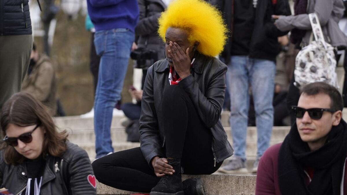 Crowds gather at Buckingham Palace in central London on April 9, 2021 after the announcement of the death of Britain's Prince Philip