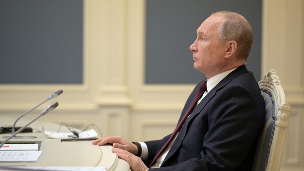 Russian President Vladimir Putin attends a video conference meeting as part of the virtual US-hosted Leaders Summit on Climate, in his residence in Moscow, on April 22, 2020. The US president hopes to rally the world on climate as he unveils more ambitious US commitments at a summit that will bring on board adversaries China and Russia and follows firmer commitments by the European Union and Britain
