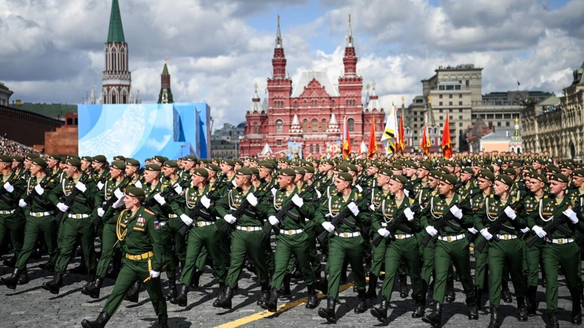 Russian servicemen march along Red Square in Moscow