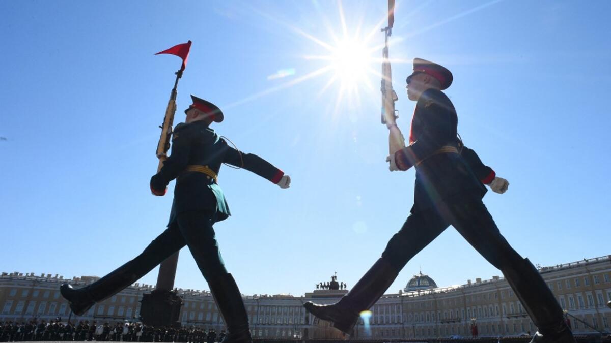 Russian honour guards march on Dvortsovaya Square during the Victory Day military parade in Saint Petersburg on May 9, 2021. Russia celebrates the 76th anniversary of the victory over Nazi Germany during World War II