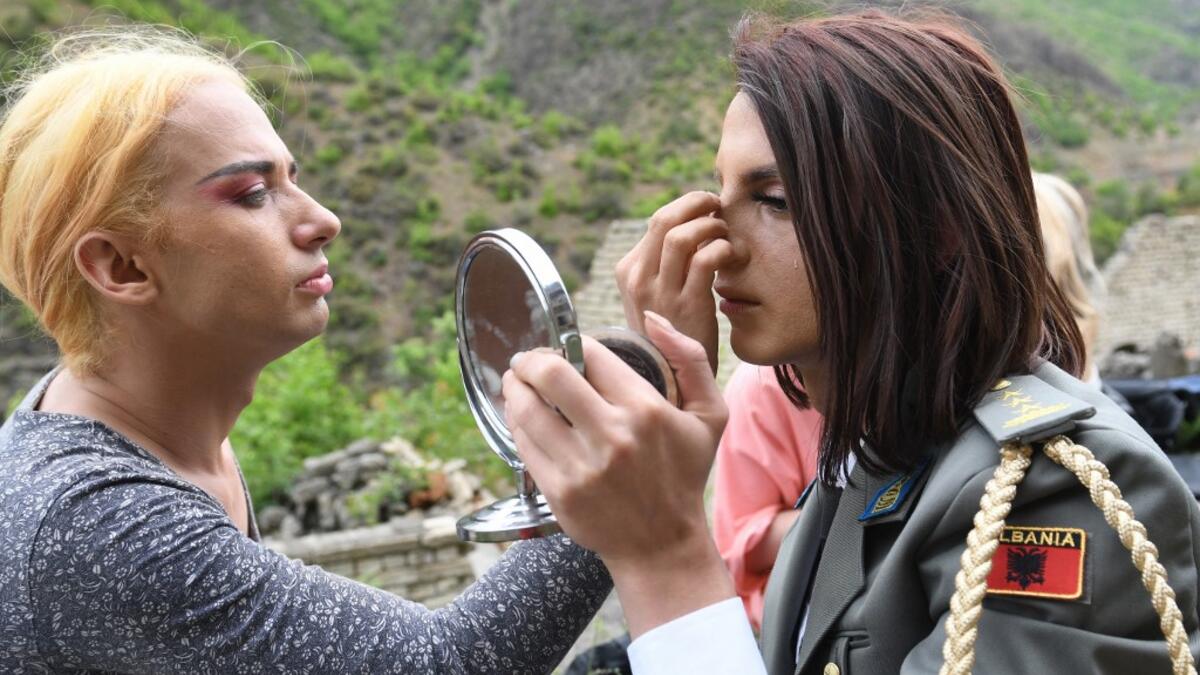 Albanian transgenders Lola (L) and Luana (R), put their makeup on, in the former Communist-era maximum security prison for political prisoners in Spac, prior to a photo shoot on May 17, 2021. For the first time, four transgender women decided to participate in an Exhibition "Being Transgender in Albania" to fight the stigma and increase awareness on trans issues.After years of isolation, she and others in the transgender community decided to confront taboos in the open for the first time.