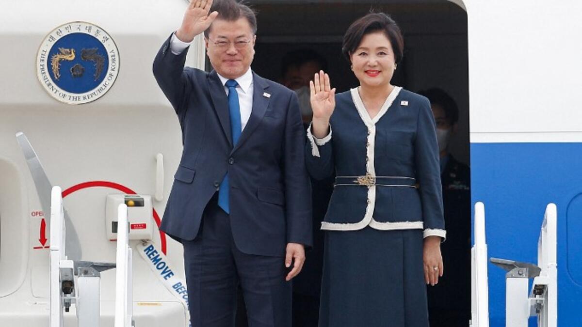 South Korea's President Moon Jae-in and South Korea's first lady Kim Jung-sook arrive at Cornwall Airport Newquay, near Newquay, Cornwall, on June 11, 2021 for the G7 summit.
