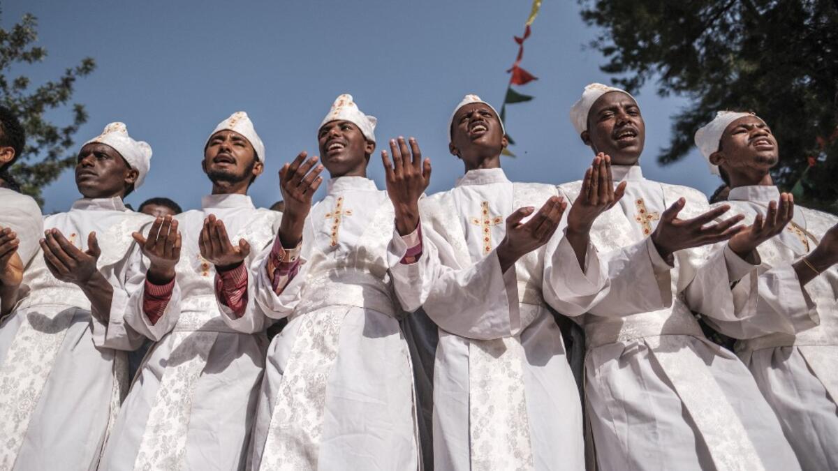 Ethiopian Orthodox devotees chant during the religious celebration of Saint Michael in the city of Bahir Dar, Ethiopia