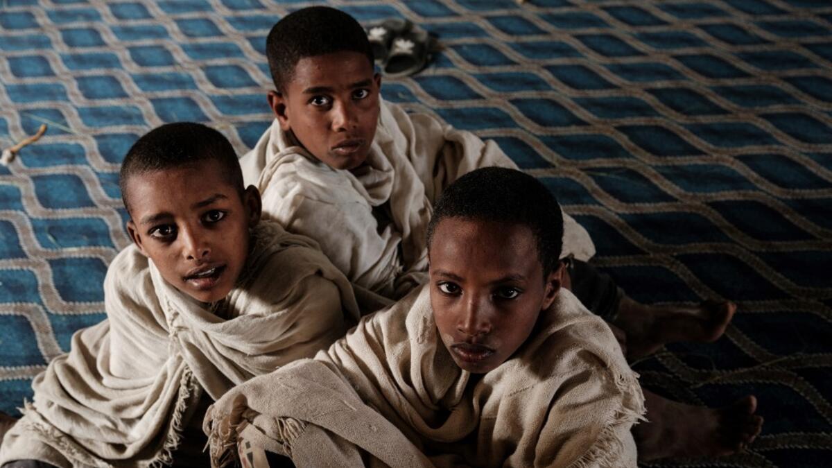 Young Ethiopian Orthodox devotees attend the Saint Michael's anniversary celebration at St. Michael church in Mekele, the capital of Tigray region, Ethiopia