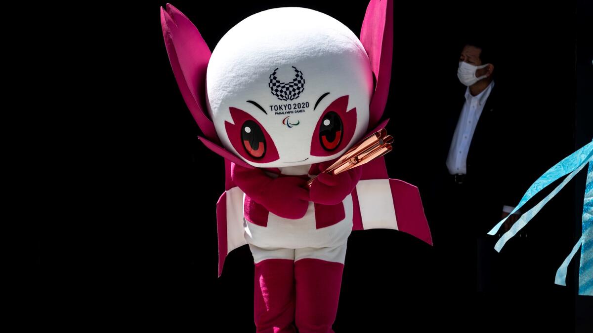 The Tokyo 2020 Paralympic mascot Someity performs during a "flame gathering event" for the Tokyo 2020 Paralympic Torch Relay at the Metropolitan Government Building in Tokyo on August 20, 2021, ahead of the start of the Paralympic Games on August 24.
