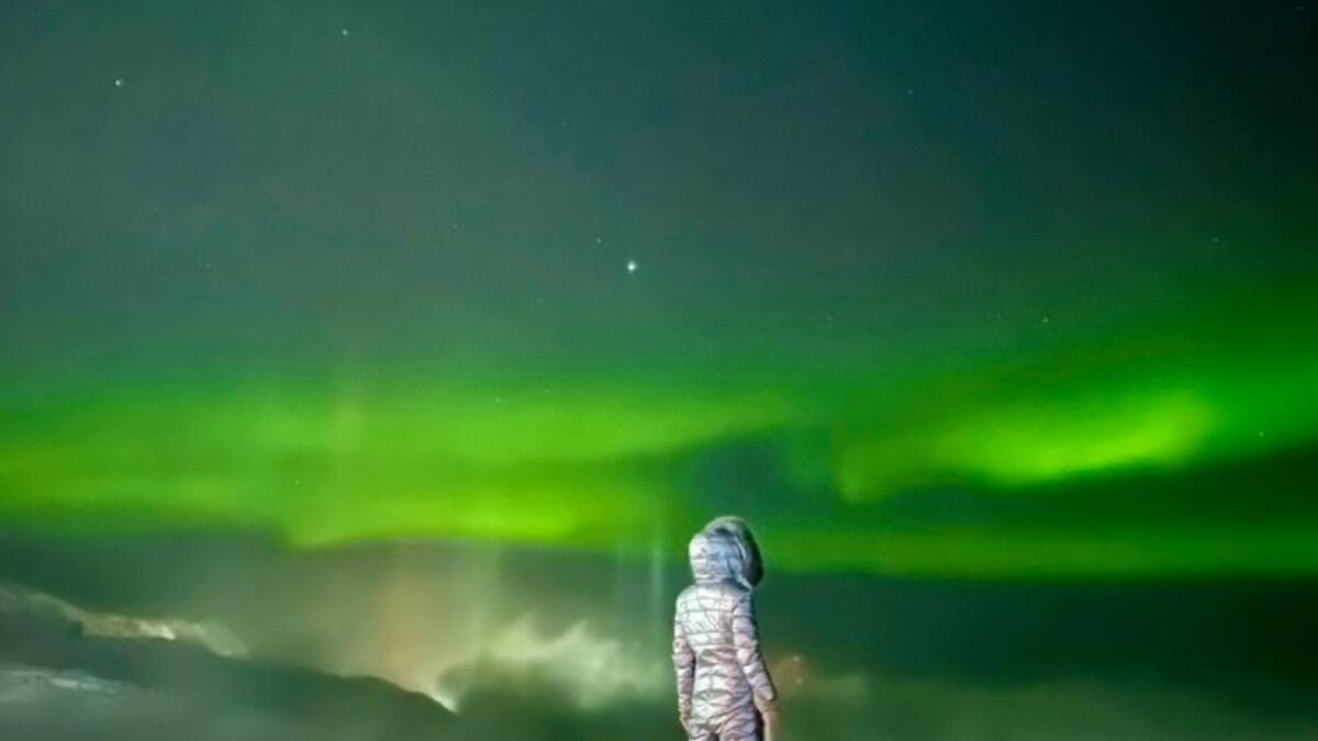 فئة السفر (المركز الأول): صورة بعنوان "سحر الشفق القطبي" للمصورة الروسية "تاتيانا ميرزلياكوفا روسيا" صُورت على iPhone 12 Pro Max